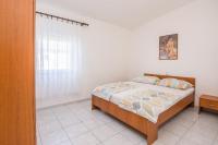Posteľ alebo postele v izbe v ubytovaní Apartments by the sea Vir - 20203