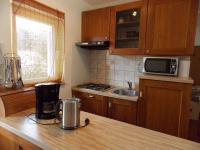 Kuchyňa alebo kuchynka v ubytovaní House Buneta