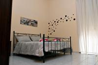 Posteľ alebo postele v izbe v ubytovaní B&B a Capua - I PORTICI del centro