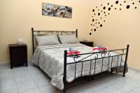 Posteľ alebo postele v izbe v ubytovaní B&B a Capua - I PORTICI del centro