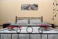 Posteľ alebo postele v izbe v ubytovaní B&B a Capua - I PORTICI del centro