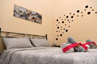 Posteľ alebo postele v izbe v ubytovaní B&B a Capua - I PORTICI del centro