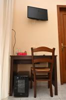 Televízia a/alebo spoločenská miestnosť v ubytovaní B&B a Capua - I PORTICI del centro