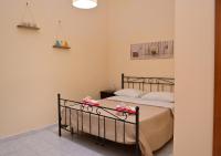 Posteľ alebo postele v izbe v ubytovaní B&B a Capua - I PORTICI del centro