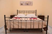 Posteľ alebo postele v izbe v ubytovaní B&B a Capua - I PORTICI del centro