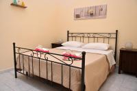 Posteľ alebo postele v izbe v ubytovaní B&B a Capua - I PORTICI del centro