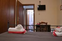 Posteľ alebo postele v izbe v ubytovaní B&B a Capua - I PORTICI del centro