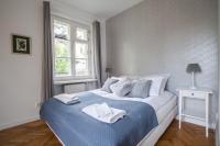 Posteľ alebo postele v izbe v ubytovaní Ego Apartments Old Town II