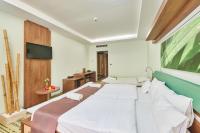 Łóżko lub łóżka w pokoju w obiekcie Vital Hotel Nautis