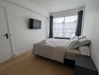 Posteľ alebo postele v izbe v ubytovaní Appt cosy en cœur de ville proche Lille - 15 min