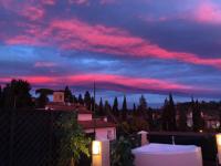 The sunrise or sunset as seen from a panziókat or nearby