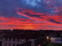The sunrise or sunset as seen from a panziókat or nearby
