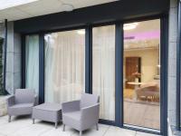 Posedenie v ubytovaní Spa Residence Carbona Mona Lila Apartman