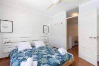 Postel nebo postele na pokoji v ubytování Callao Perfect Stay by Sunkeyrents