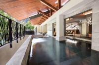 an indoor pool in the lobby of a house at Wulai Pause Landis Resort in Wulai