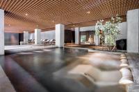 a room with a dance floor in a building at Wulai Pause Landis Resort in Wulai