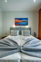 Postel nebo postele na pokoji v ubytování Angelica Hotel