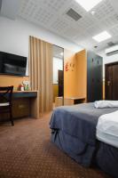Hotel Poniatowskiにあるベッド