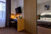 Hotel Poniatowskiにあるベッド