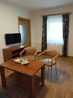 Telewizja i/lub zestaw kina domowego w obiekcie Penzion Villa Marion