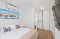 Posteľ alebo postele v izbe v ubytovaní Seabreeze Apartments Cavtat