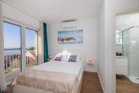 Posteľ alebo postele v izbe v ubytovaní Seabreeze Apartments Cavtat