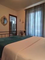 Posteľ alebo postele v izbe v ubytovaní Villa Bonetti
