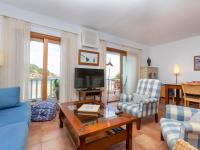 Televízia a/alebo spoločenská miestnosť v ubytovaní Apartment Sa Riera Beach by Interhome