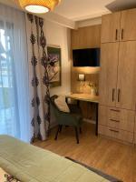 Televízia a/alebo spoločenská miestnosť v ubytovaní Apartament Czarna Owca - Grapa SUN & SNOW 667-494-631