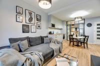 Ein Sitzbereich in der Unterkunft Waterlane Riverside - SPA, Pool, Gym &amp; Parking by Downtown Apartments
