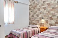 Postel nebo postele na pokoji v ubytování Chalet Pradillo II