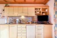 A kitchen or kitchenette at Adang Ferienwohnung Etschtal