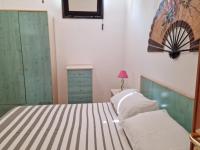 A bed or beds in a room at Viestecasa