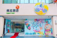 a store front with colorful paintings on the wall at Legend Hotel Kaohsiung Liuhe in Kaohsiung
