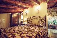 Llit o llits en una habitaci&oacute; de Militsa Guesthouse