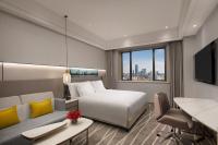Crowne Plaza Shanghai Nanjing Road by IHGにあるテレビまたはエンターテインメントセンター