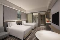 Crowne Plaza Shanghai Nanjing Road by IHGにあるベッド