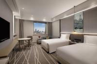 Crowne Plaza Shanghai Nanjing Road by IHGにあるベッド