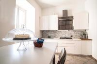 A kitchen or kitchenette at Casa Futura Trastevere