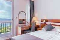 Posteľ alebo postele v izbe v ubytovaní Hotel Horizont