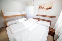 Łóżko lub łóżka w pokoju w obiekcie Appartement Zentrum