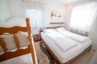 Łóżko lub łóżka w pokoju w obiekcie Appartement Zentrum