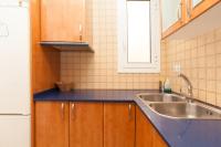 Kuchyňa alebo kuchynka v ubytovaní Apartment Aptucat