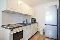 Kuchyň nebo kuchyňský kout v ubytování Apartmány Zaječák