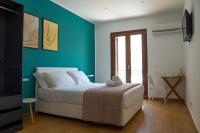 Posteľ alebo postele v izbe v ubytovaní Verdirooms158
