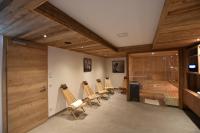 Televízia a/alebo spoločenská miestnosť v ubytovaní Tanners Chalet Apartments