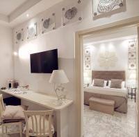 Telewizja i/lub zestaw kina domowego w obiekcie FLOS Guest House