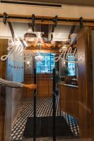 a view of the front door of a restaurant at Dossier in Portland