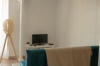 Telewizja i/lub zestaw kina domowego w obiekcie Studio Ouistreham entre centre-ville et plages