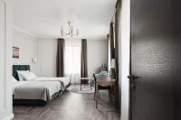 VICTORIA Hotel Klaipėdaにあるベッド